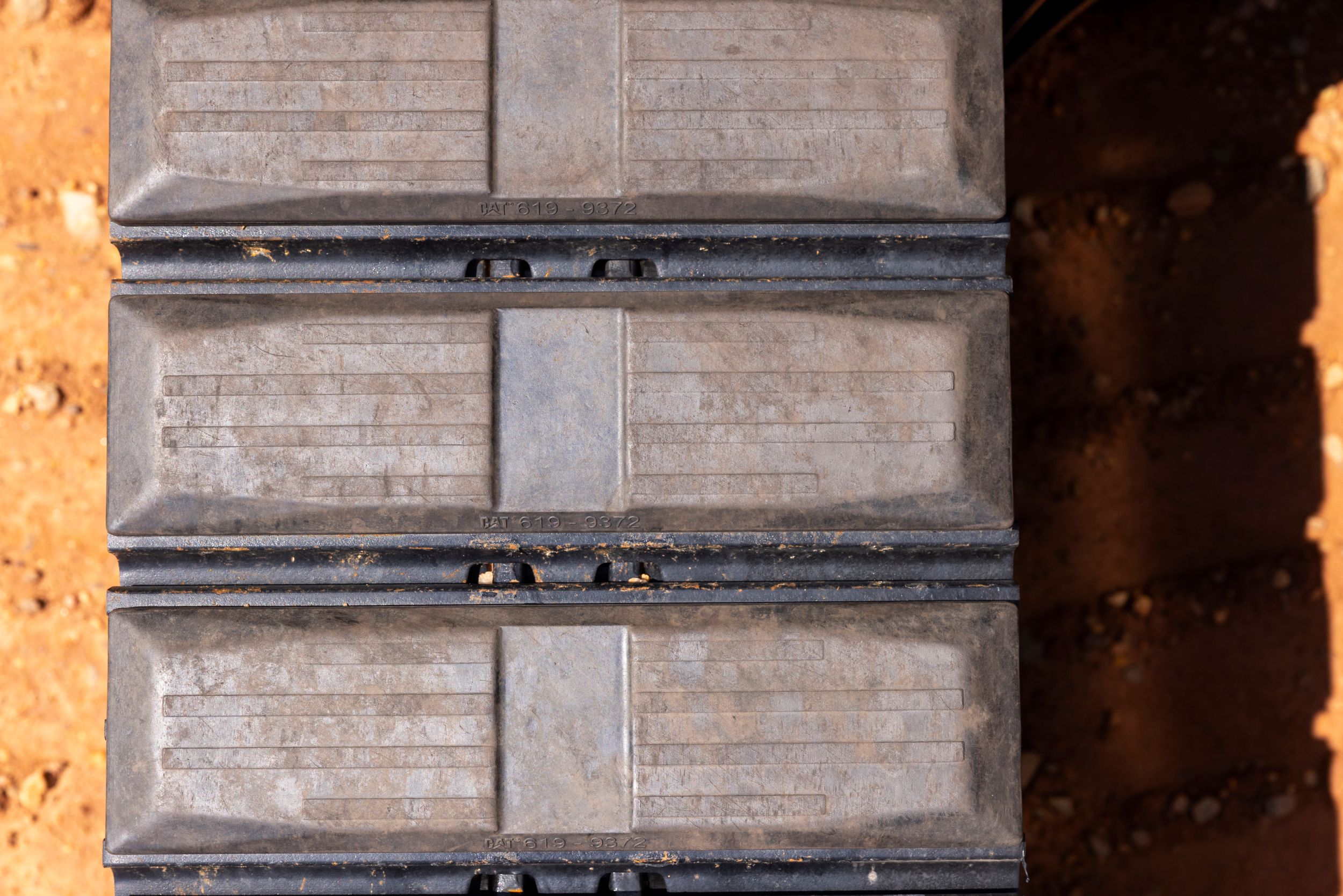 Esteiras de aço com bases de borracha