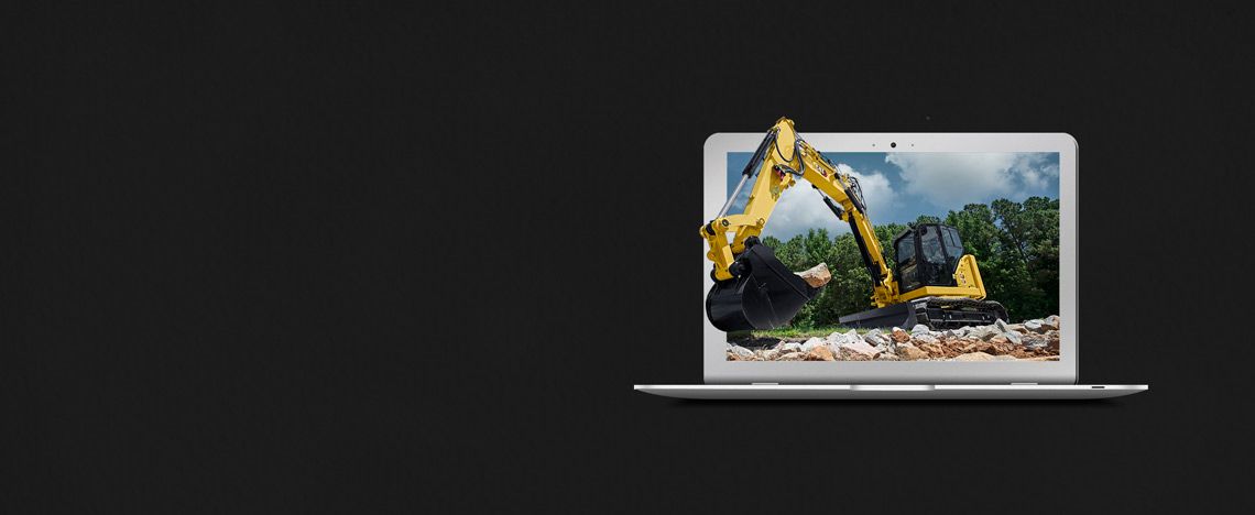 Computer with mini excavator jumping out of the screen