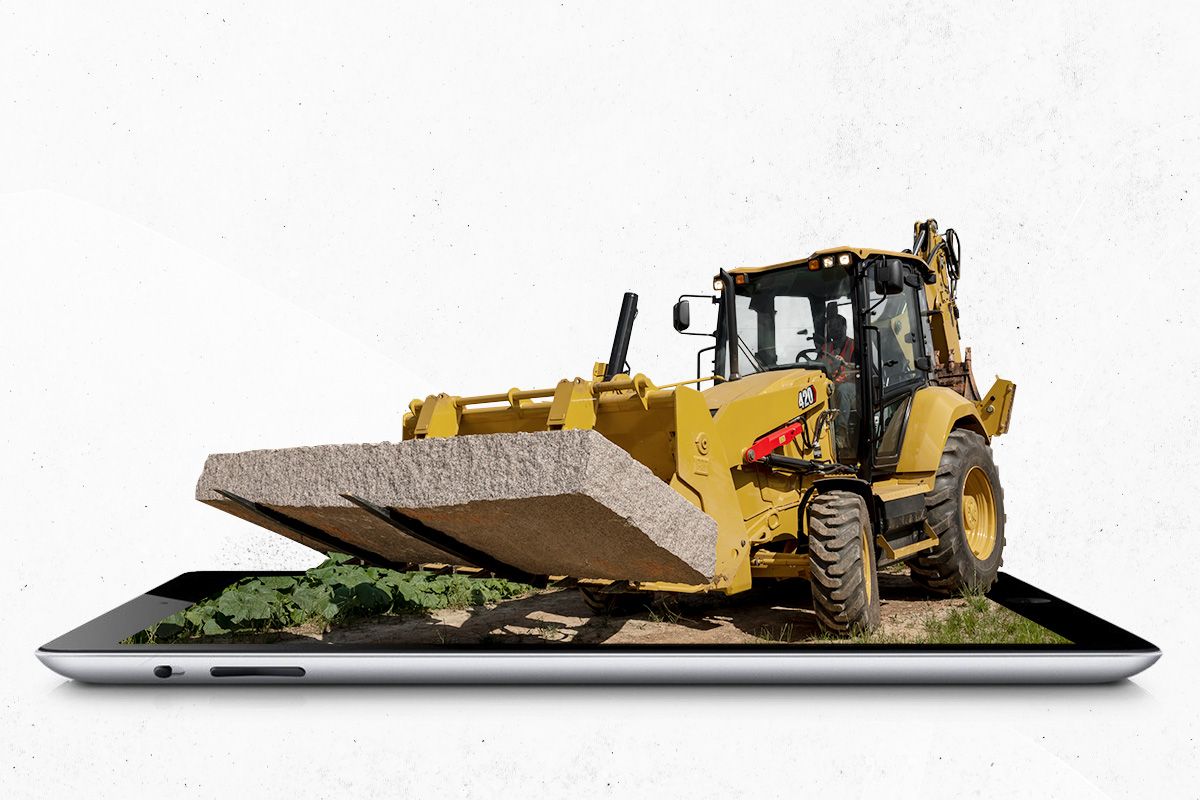 Backhoe loader on top of a tablet
