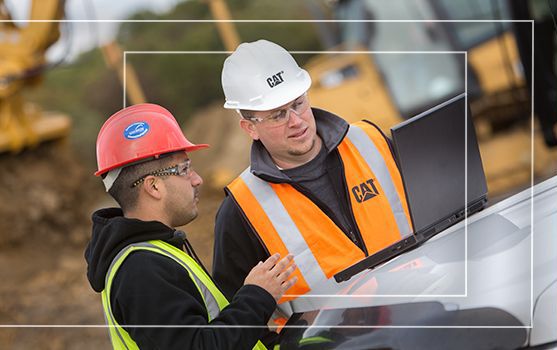 Two workers on a construction site. 