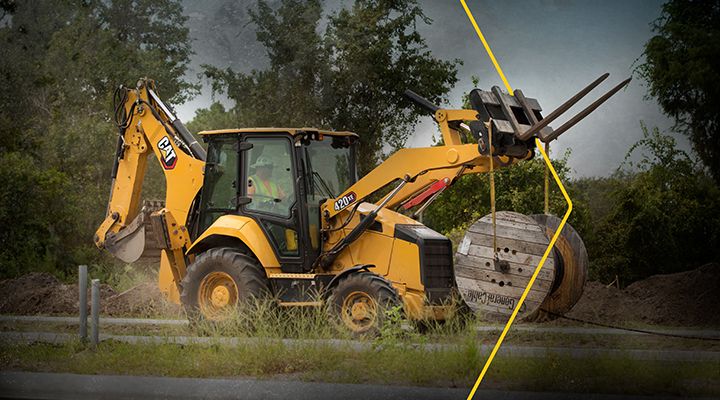 Backhoe loader on black and white background