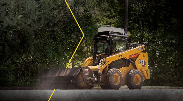 Skid steer loader on black and white background